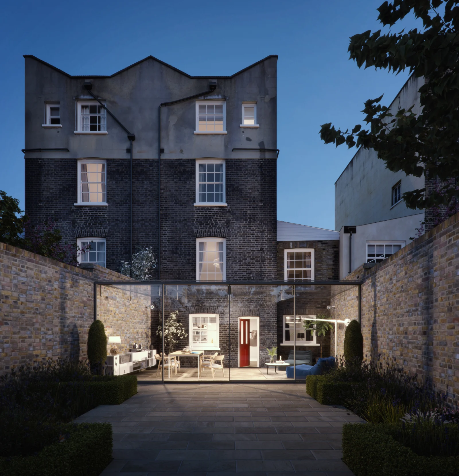 Greenwich townhouse garden with a glazed living space between rebuilt brick walls and FineLine multi-panel sliding doors
